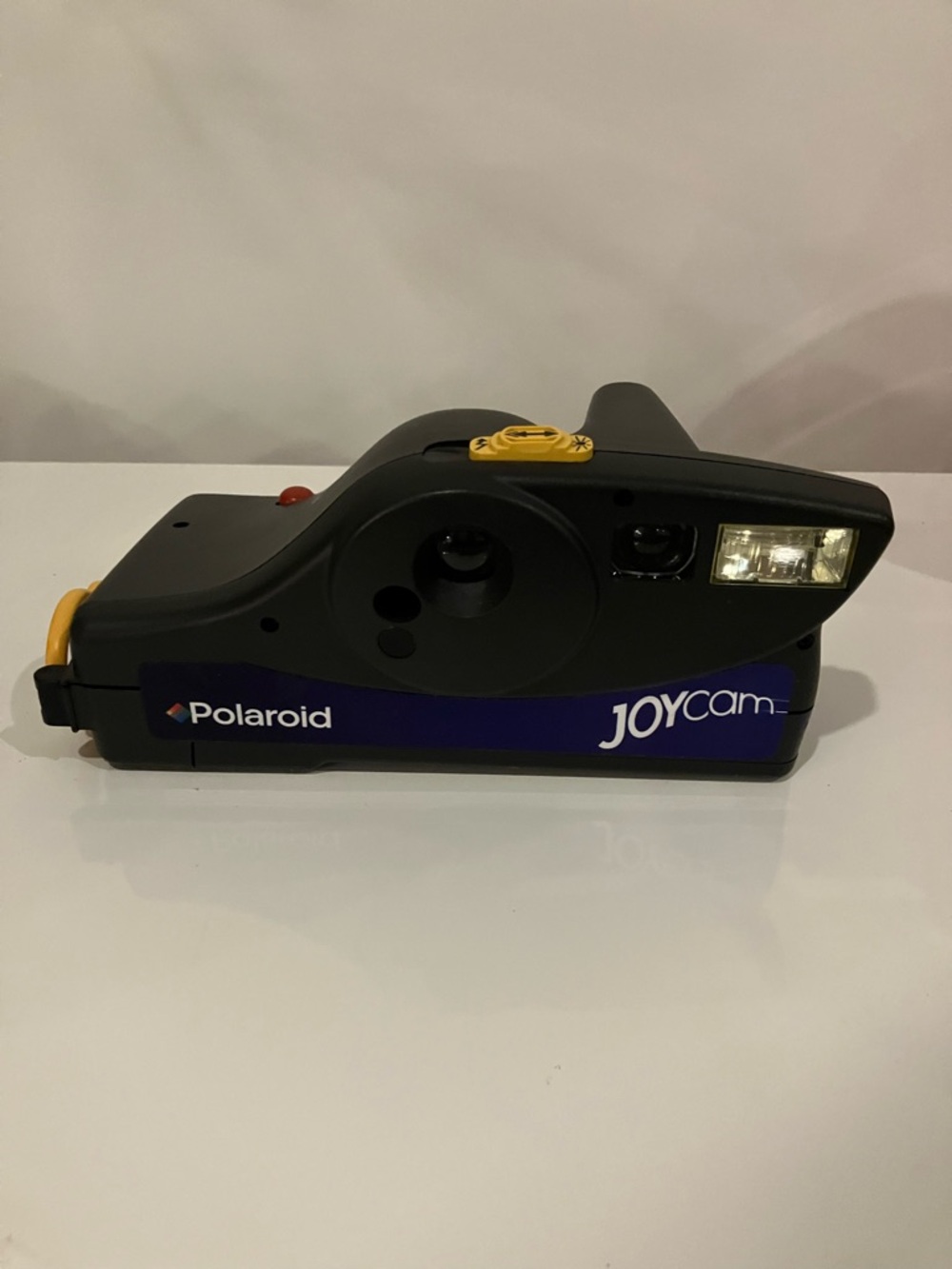 Polaroid JoyCam Instant Film Camera — Black with Purple and Yellow Accents